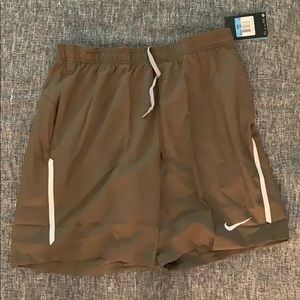 Greenish grey medium Nike tennis shorts